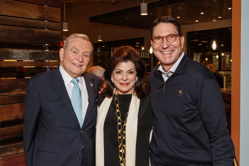 Dave and Laura Ward, left, with Scott McClelland at the H-E-B San Felipe and Table 57 Social February 2015