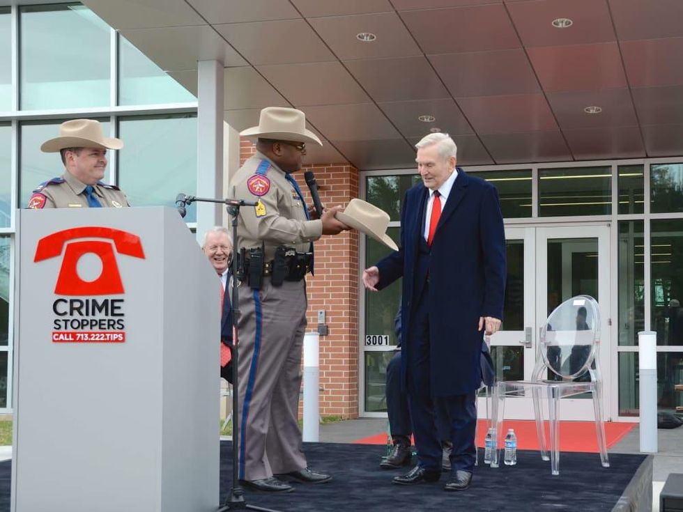 Dave Ward gets Texas State Trooper hat at dedication of Crime Stoppers new building