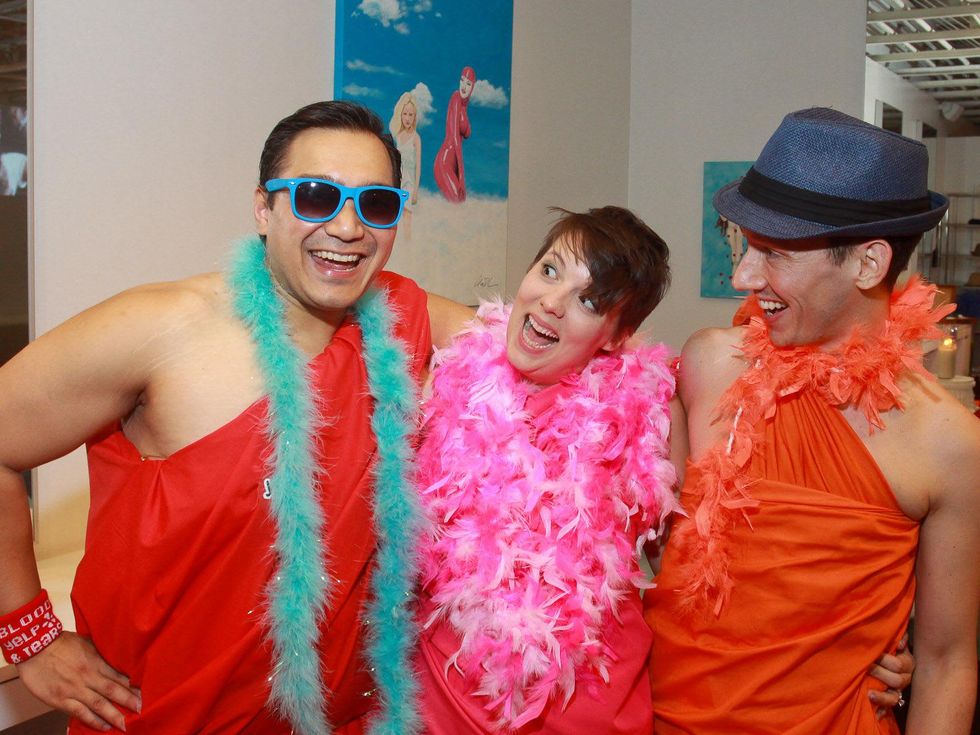David Nguyen, from left, Jenny Noonan and Nathan Herrington at toga party at Craft Salon benefiting Bering Omega