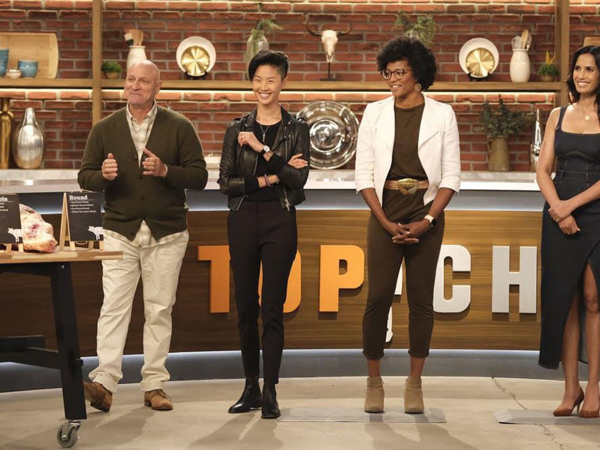 Dawn Burrell, second from right, joins Kristen Kish, Tom Colicchio, and Padma Lakshmi.