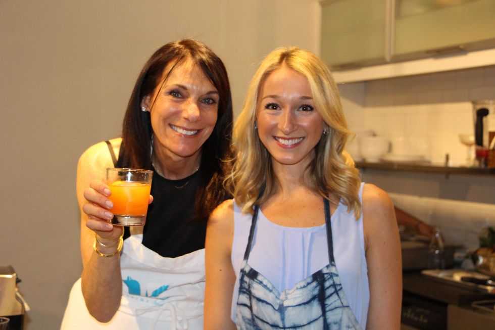 Debbie Rosengart, left, and Erin O' Leary Stewart at the Define Body & Mind cocktail party July 2014