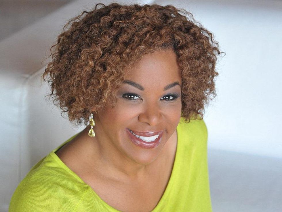 Deborah Duncan head shot yellow top