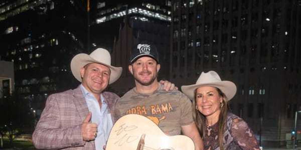 Easton Corbin and Dolly-signed guitar star at Houston nonprofit's Western gala