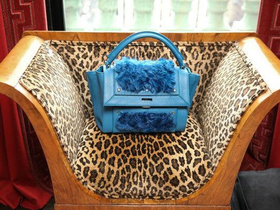 Dee Ocleppo handbag and leopard chair at Plaza apartment