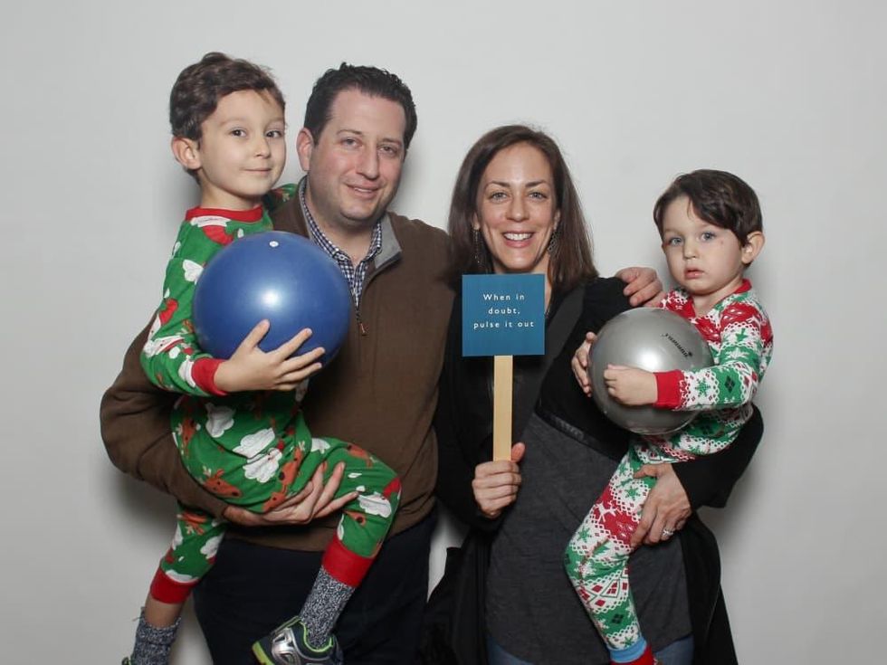 Define Body and Mind holiday soiree Josh Schaffer, Emily Schaffer.