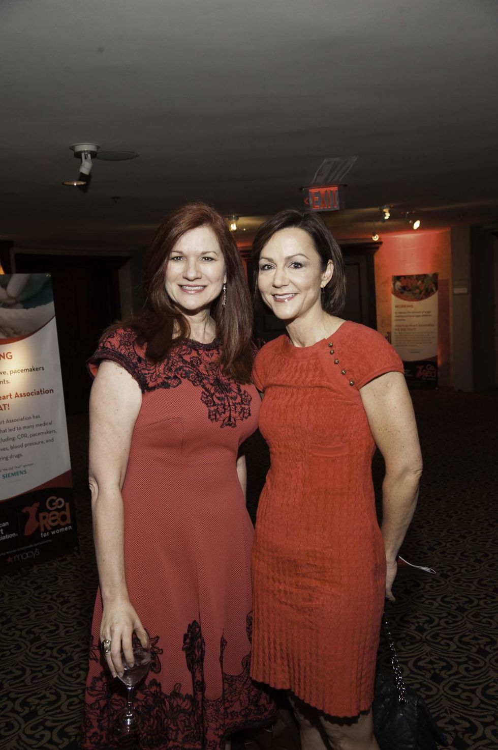 Denice Pittman, left, and Suzy Sherron at the Go Red For Women luncheon May 2014
