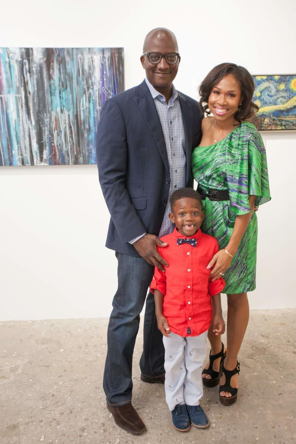 Derick Mitchell and Roslyn Bazzelle Mitchell with their son, Derick Mitchell, at the Art on the Avenue Auction Party