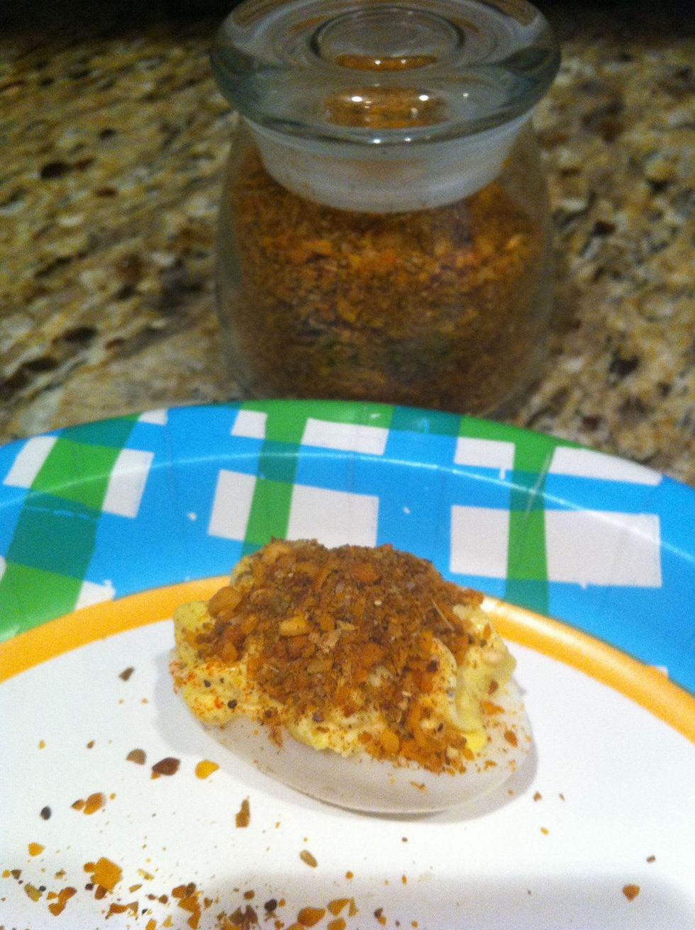 deviled egg with spices on top
