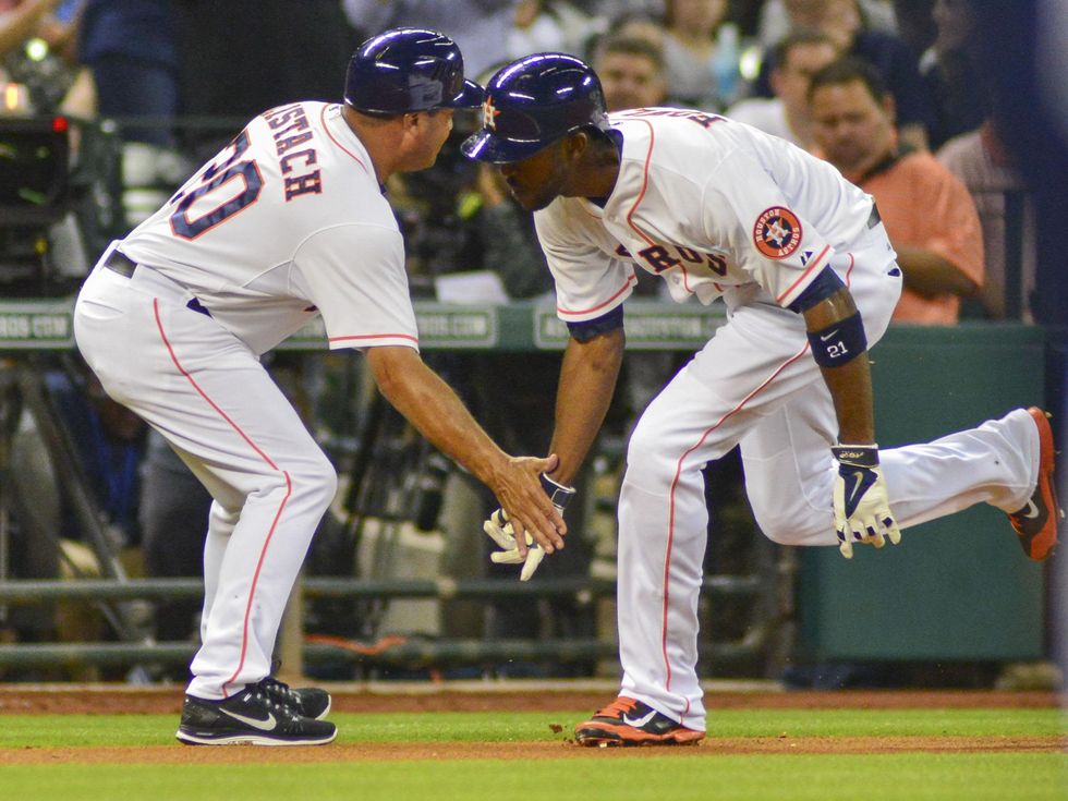 Dexter Fowler low high five