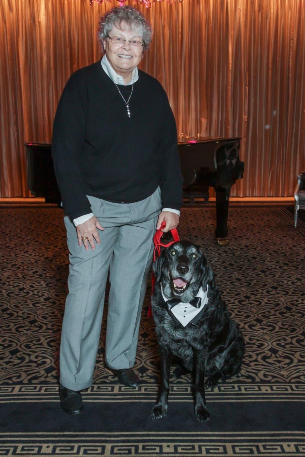 Doggie fashion show winner Pat Wild and Willie at Interfaith Ministries brunch