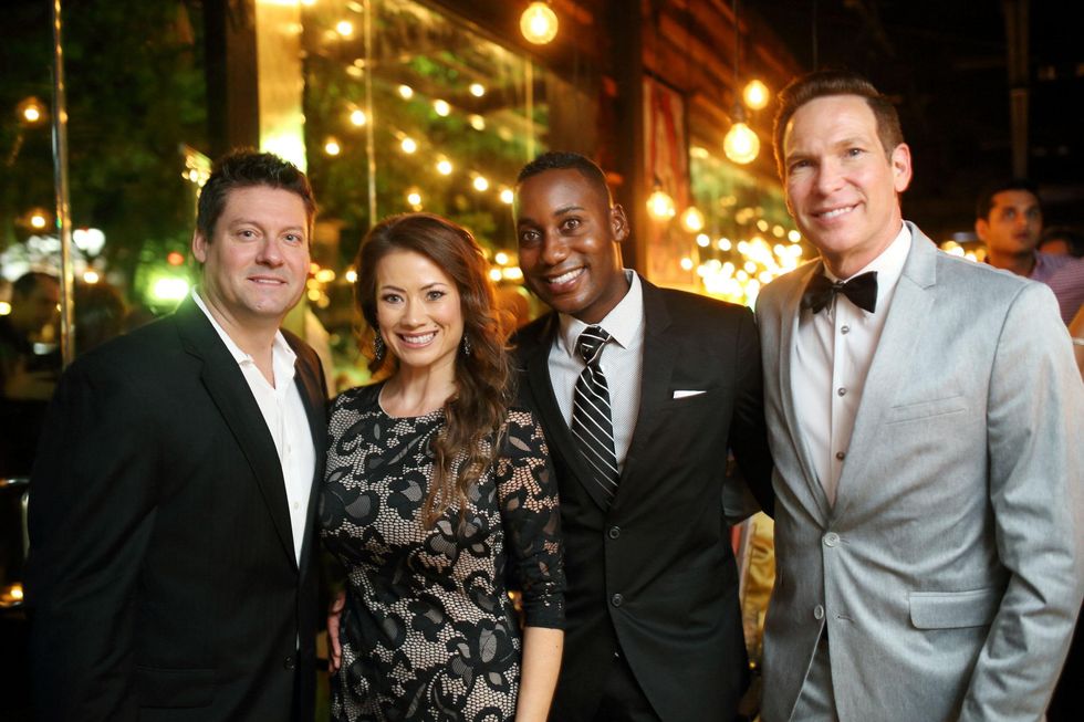 Don Smith, from left, Patricia Messick, Derek Smith and Keith Messick at Ruggles Black Grand Opening October 2014