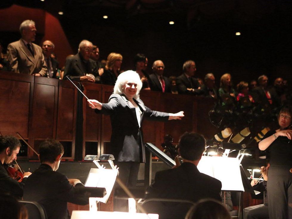 Donna Bruni conducts the National Anthem at the Houston Grand Opera Opening Night celebration October 2013