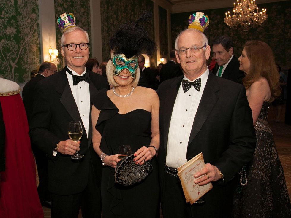 Doug Sandvig, from left, Margo Geddie and Bill LaFuze at the University of St. Thomas Mardi Gras March 2014