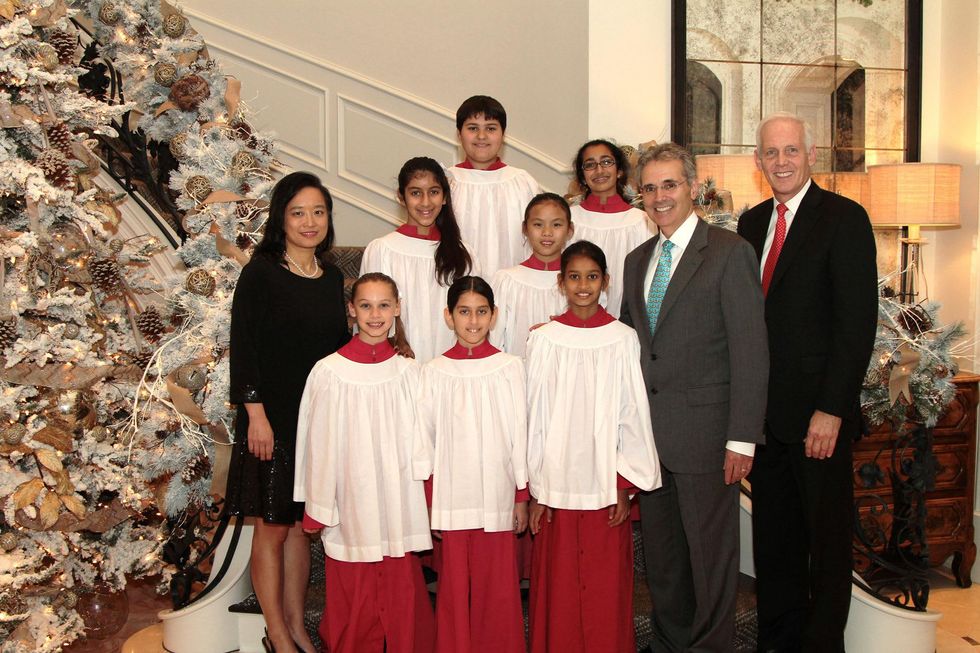 Dr. Lynda Chin, Dr. Ron DePinho and Stephen Roddy with the choir at the 9th Annual Santa's Elves Event December 2014
