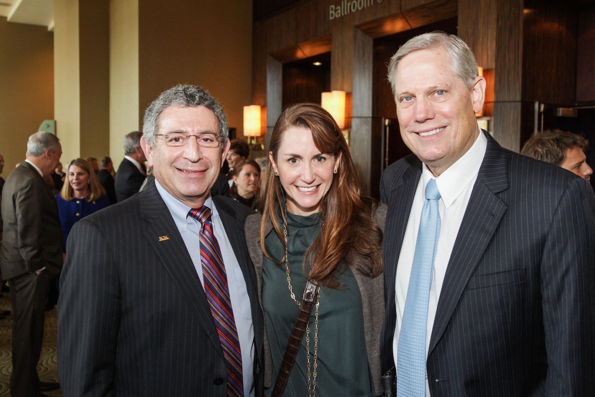 Dr. Paul Klotman, left, Brooke Robertson and Corby Robertson Jr ...