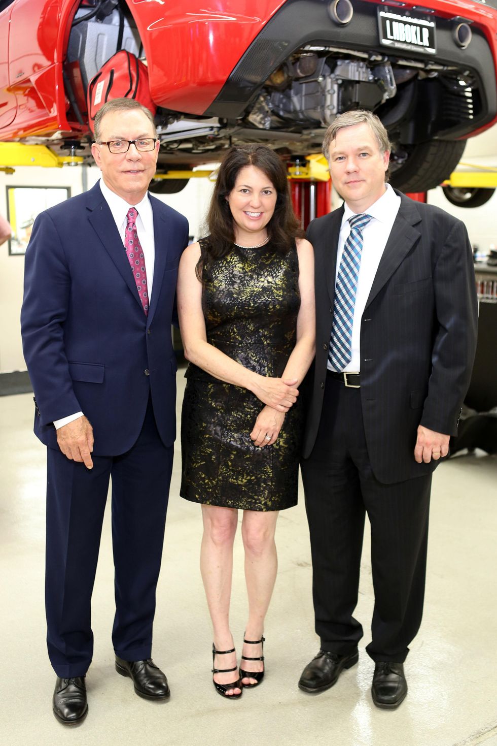 Dr. Stanley Jones, from left, with Elizabeth and Andrew Knizley at the Joints in Action at Ferrari of Houston June 2014
