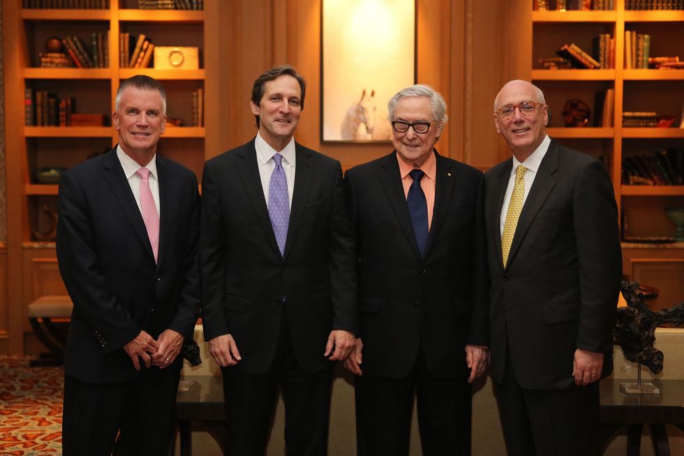 Dr. Stephen L. Moore, from left, David Grimes, Dr. Bud Frazier and Dr. Jerome Granato at the Bud Frazier event May 2014