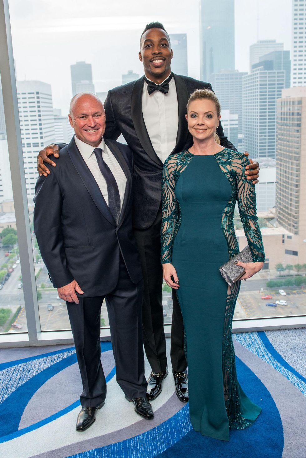 Dr. Walt Lowe, from left, Dwight Howard and Dawn Lowe at the Circle of Life Gala April 2015