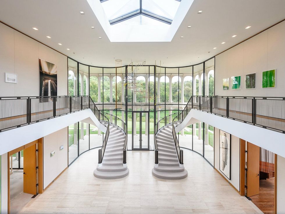 Dual staircases at 10210 Strait Ln. in Dallas