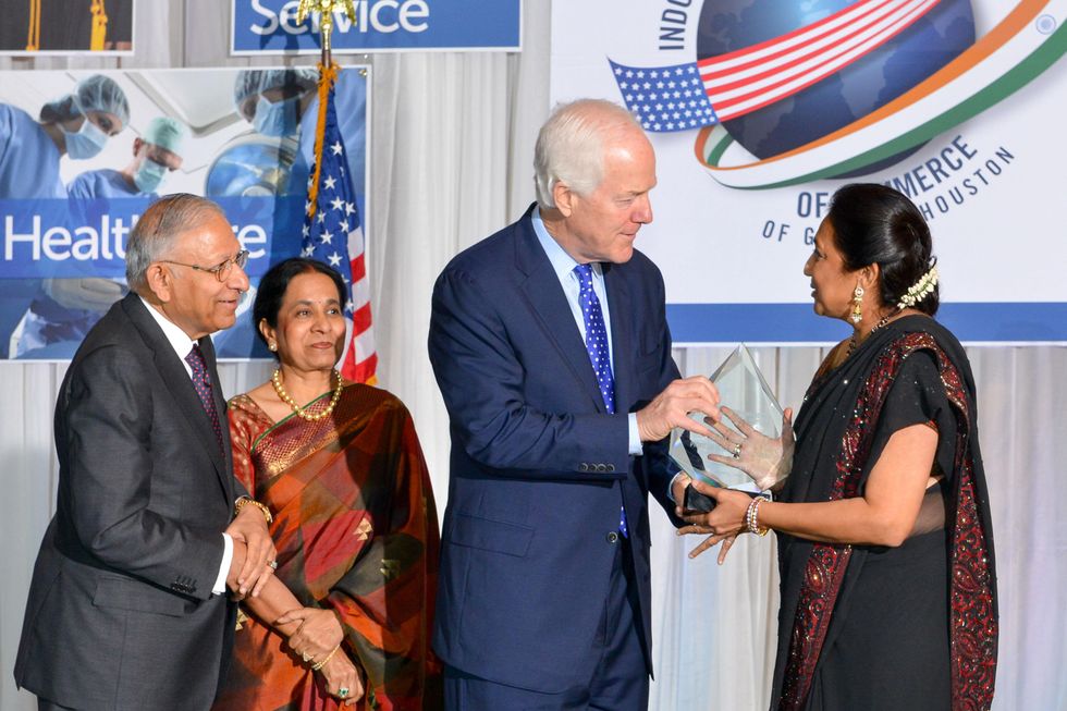 Durga and Sushila Agrawal, from left, John Cornyn and Sonal Bhuchar at the IACCGH Gala October 2014