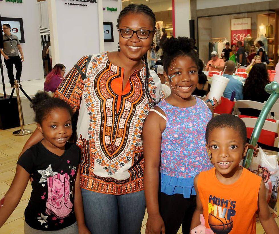 E.J. Unegbu with Abigail Naomi and Daniel