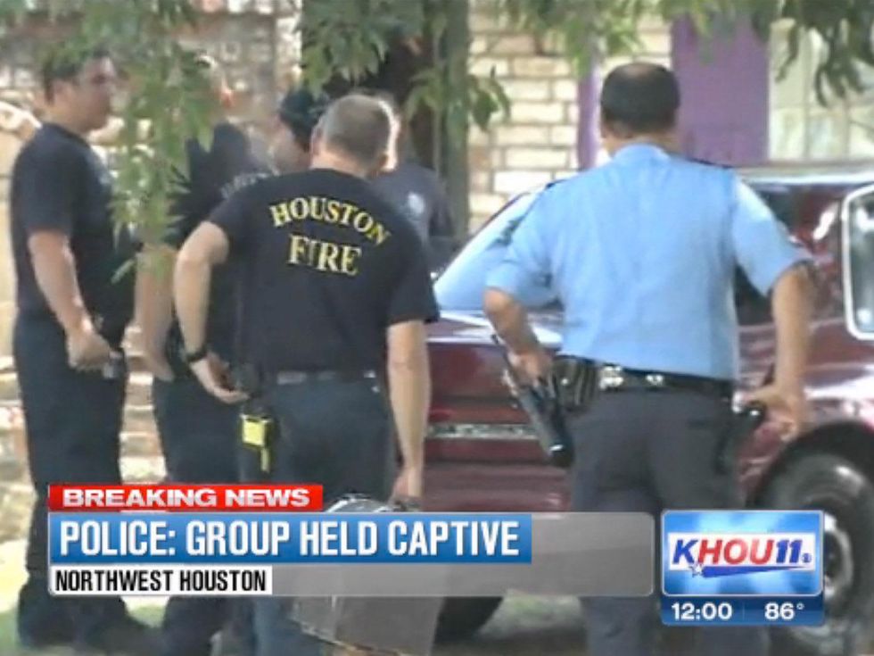 eight people found held captive in Houston home July 2013 RUN FLAT