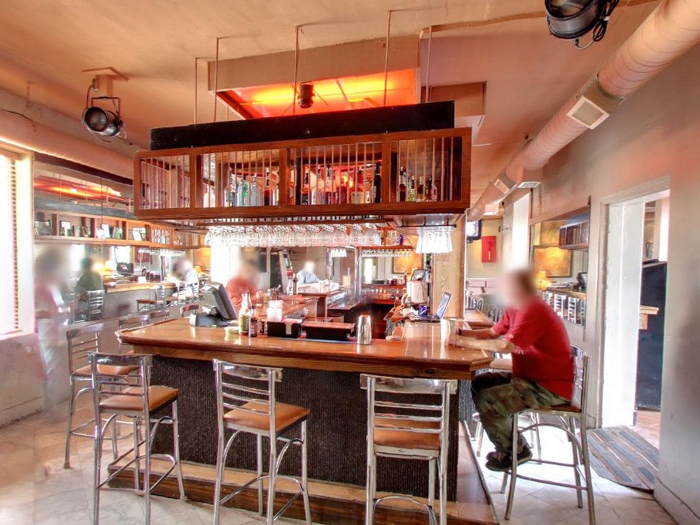 EJ's Bar Houston interior with people