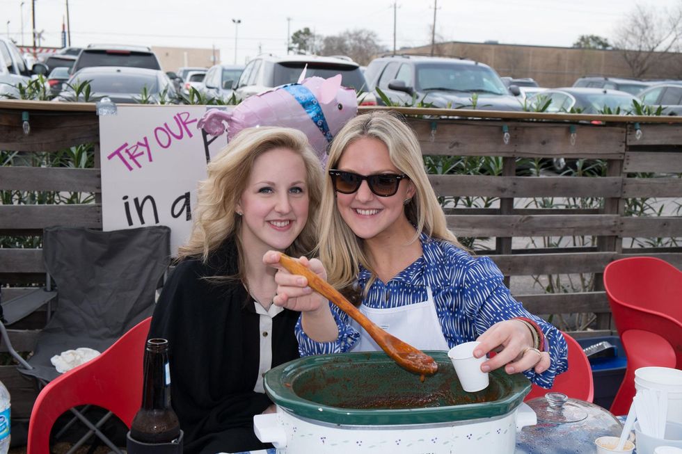 Eleanor Mode, left, and Coralin Mode at the Casa de Esperanzas Young Professional Chili Cook-off February 2014