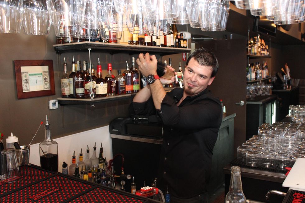 Eleven XI bar Houston April 2013 bartender shaking drink