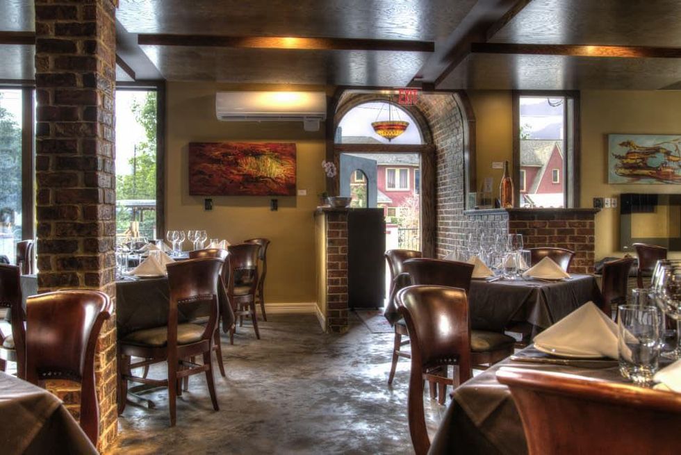 Eleven XI bar Houston April 2013 interior seating chairs and tables