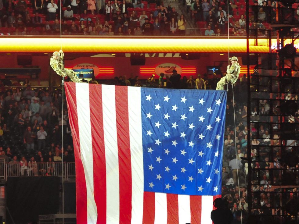 Eli Young Band, flag, at Houston rodeo March 2014