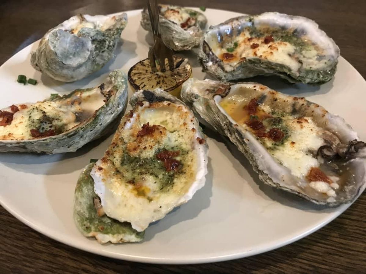 Roasted gulf oysters with chorizo. CultureMap Houston