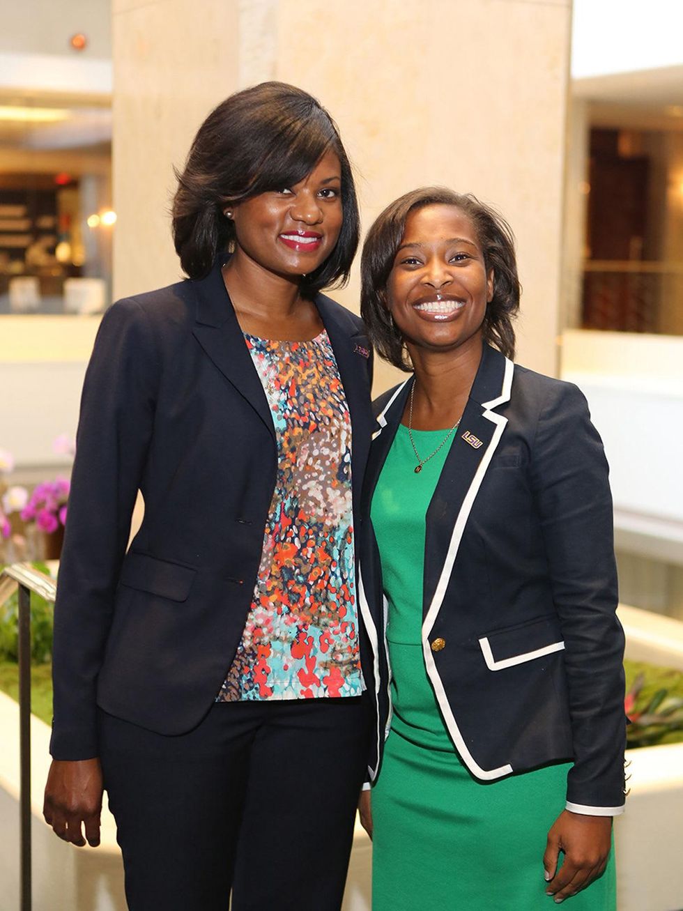 Emi Gilbert, left, and Norisha Kirts at the LSU Foundation luncheon June 2014