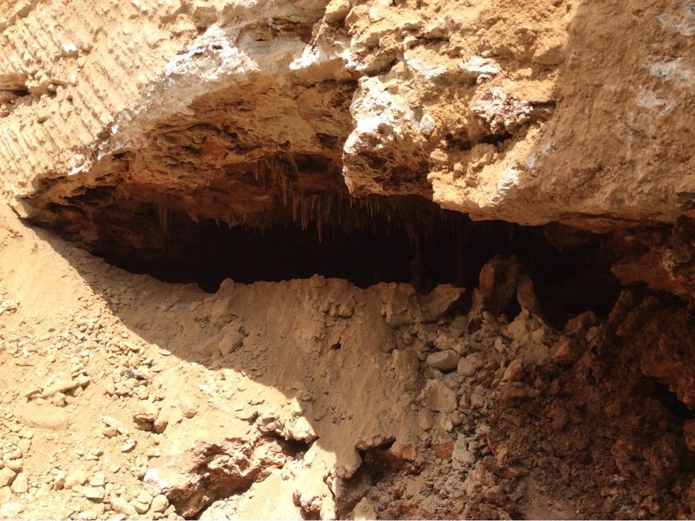 entrance to McNeil High School cave in construction trench