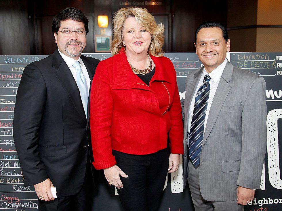 Eric Marin, from left, Brenda Stardig and Ed Gonzalez at the Neighborhood Centers' Heart of Gold Celebration February 2014