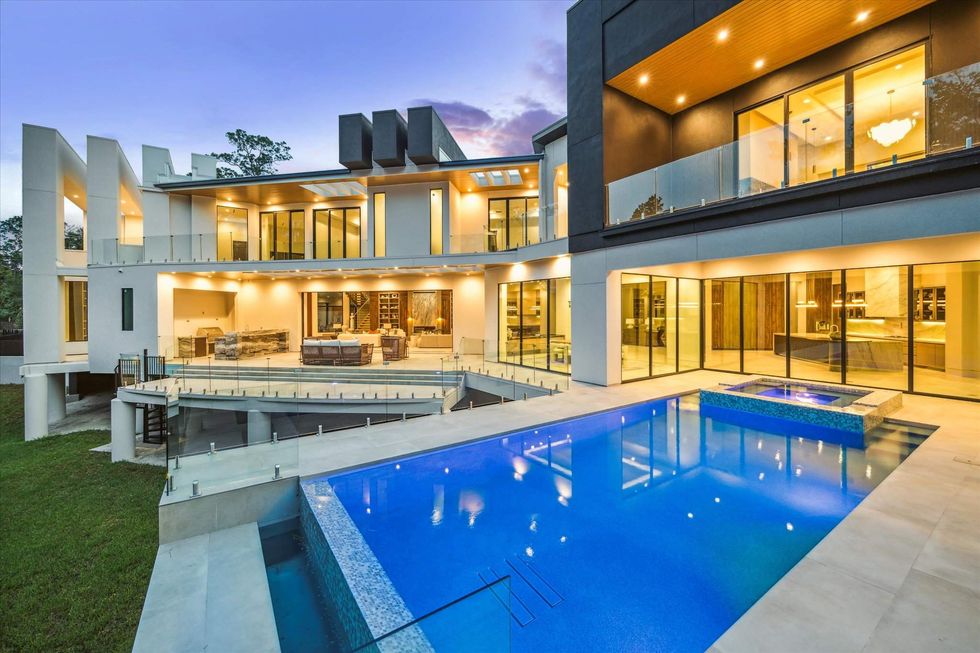 Exterior with pool and backyard views of 11264 Memorial