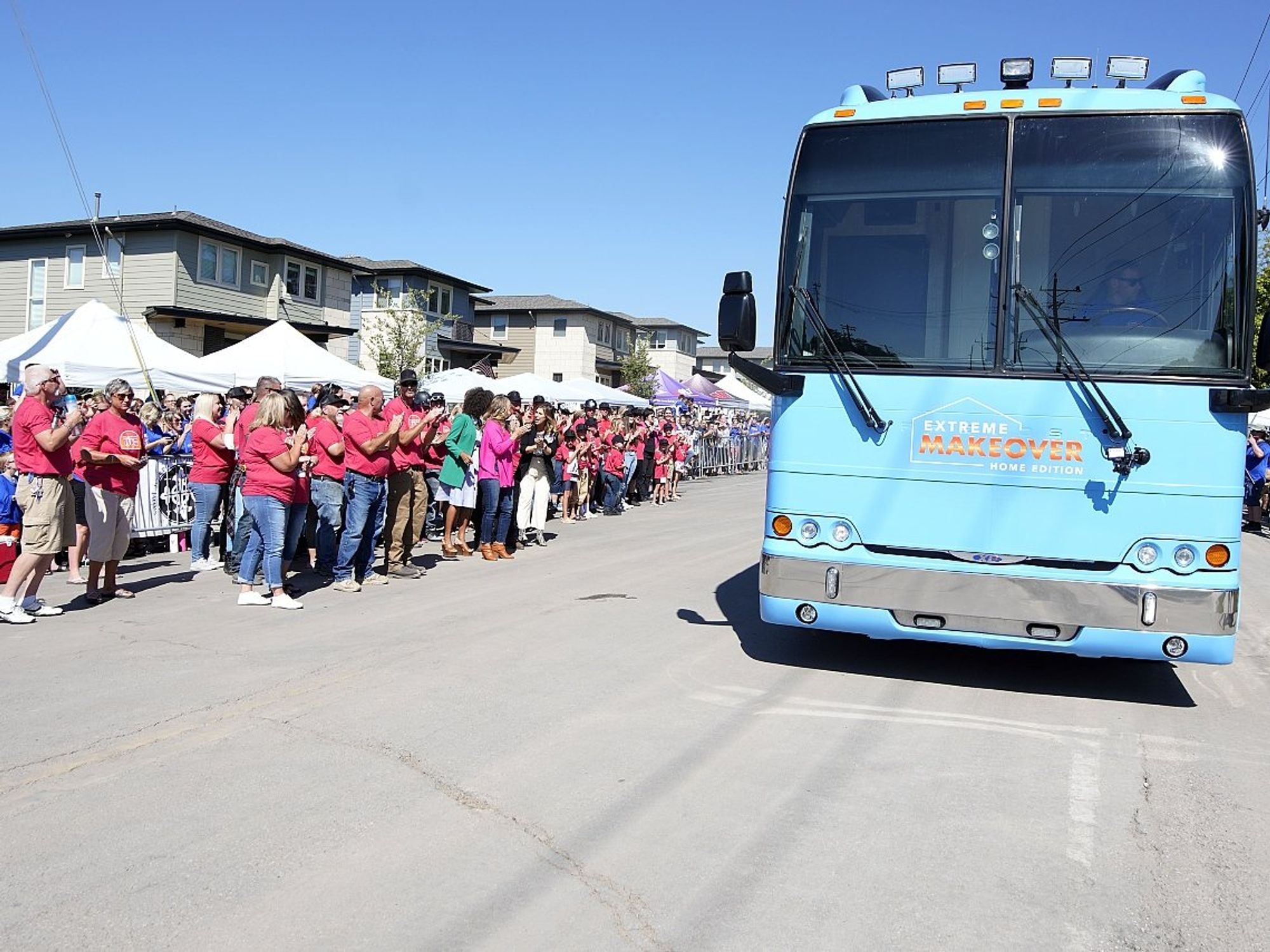 Extreme Makeover Home Edition bus crowd