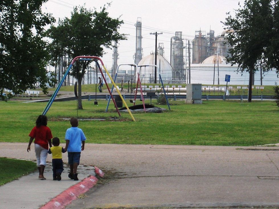 Exxon power plant energy company in Baytown with playground in foreground