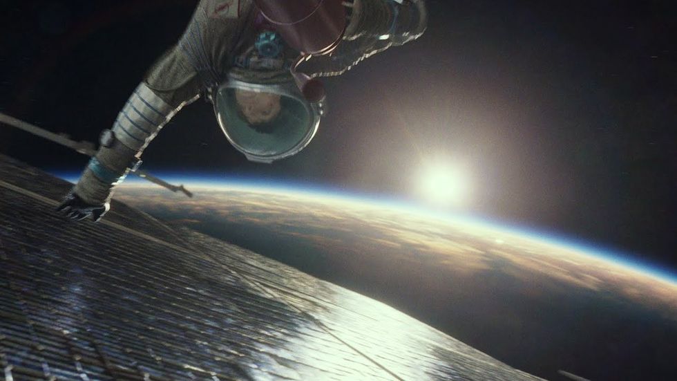 Sandra Bullock out acts George Clooney in the stunning Gravity, the rare movie with real magic