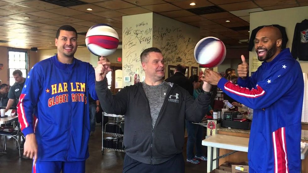 Harlem Globetrotters take fans for a spin at celebrity barbecue joint