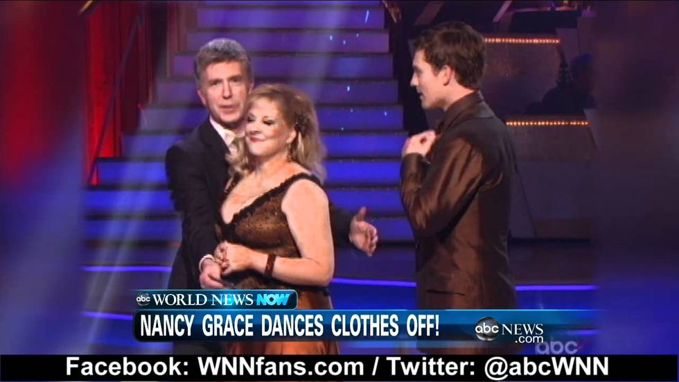 Nancy Grace tries to cover up her DWTS wardrobe malfunction, but this nipple'sout of the bag