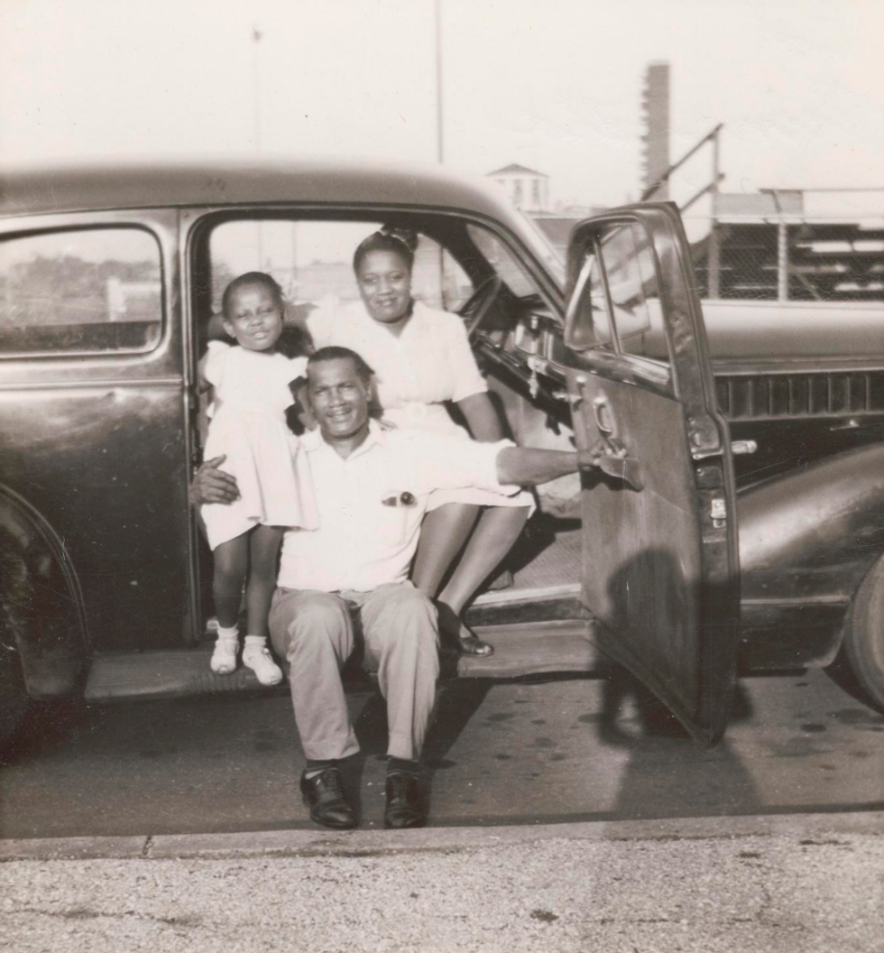 'Family posed inside car, ca. 1950' from \u201cThe Negro Motorist Green Book.\u201d
