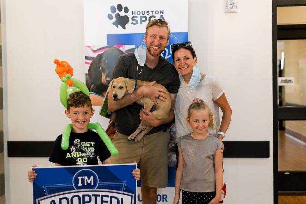 Family with adopted dog