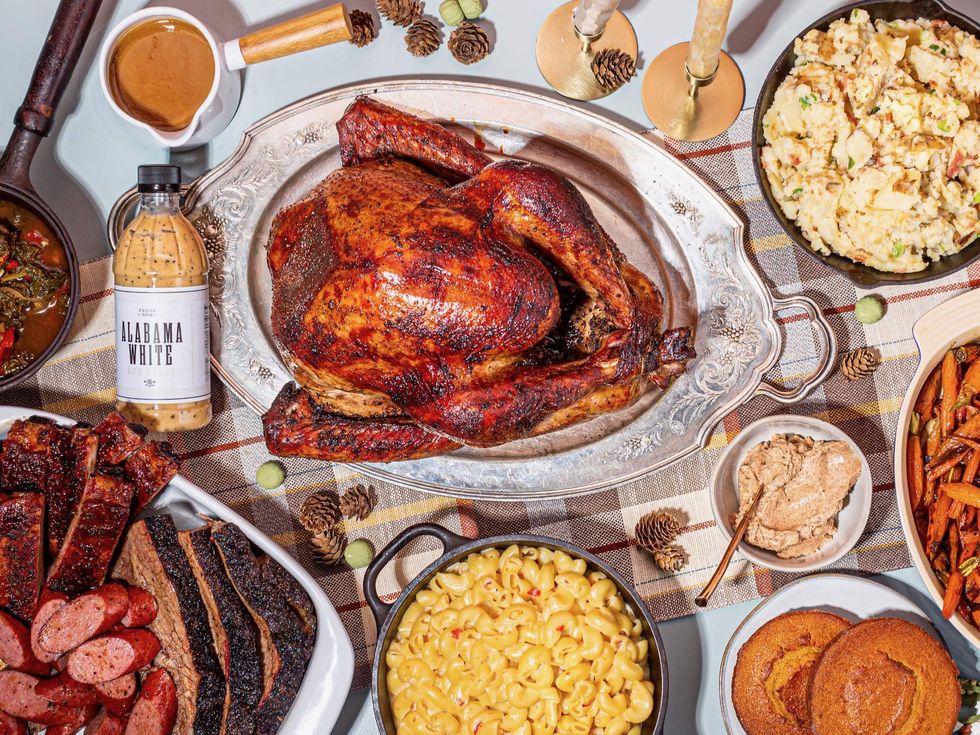 Feges BBQ Thanksgiving to-go selections including turkey, mac and cheese, brisket, and other sides.