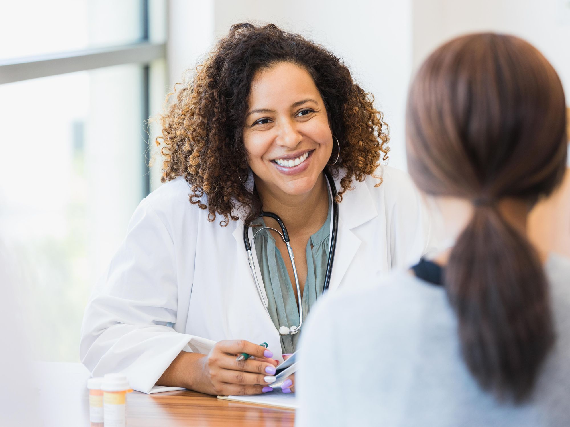 Female doctor and patient