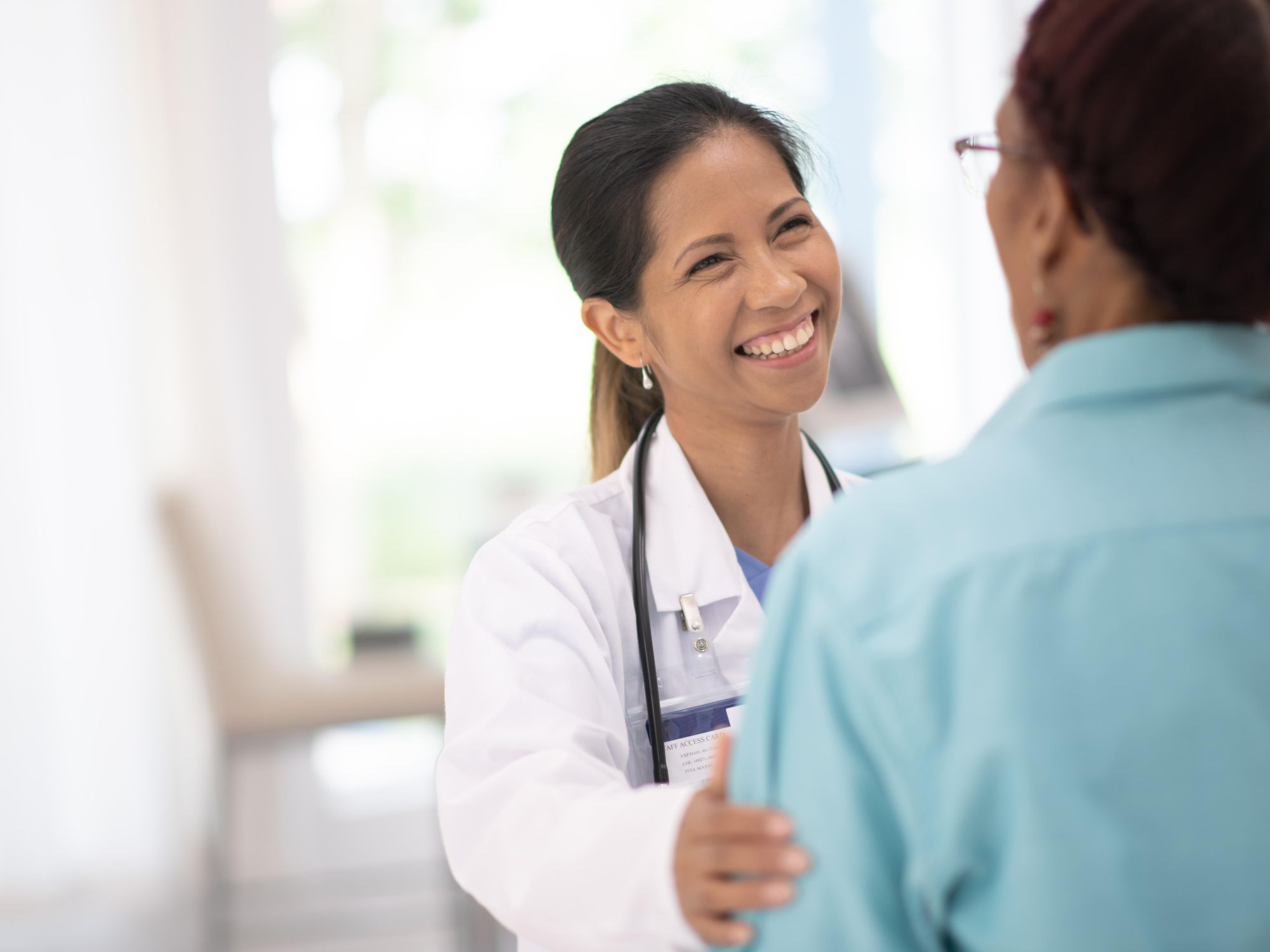 Female doctor and patient