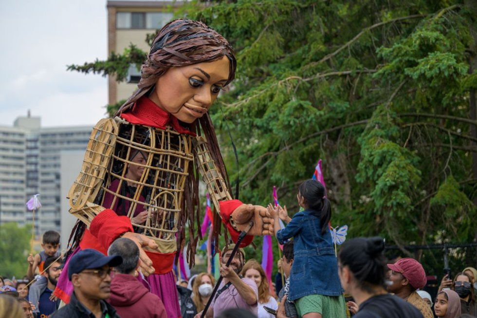 Finding My Team: Little Amal Visits Gulfton