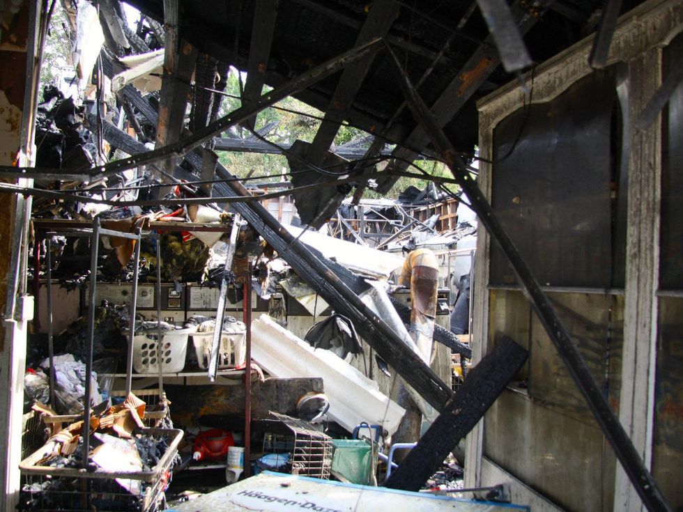fire at hair salon and laundry mat Houston August 2013