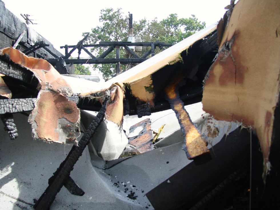 fire at hair salon and laundry mat Houston August 2013