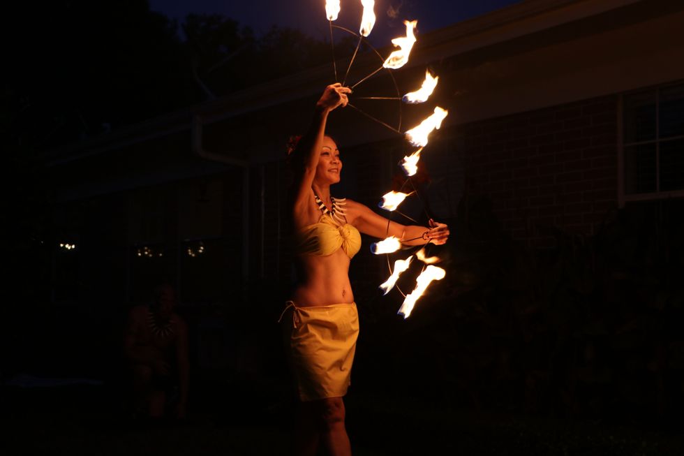 Fire dancer from Malia\u2019s Hula Hut